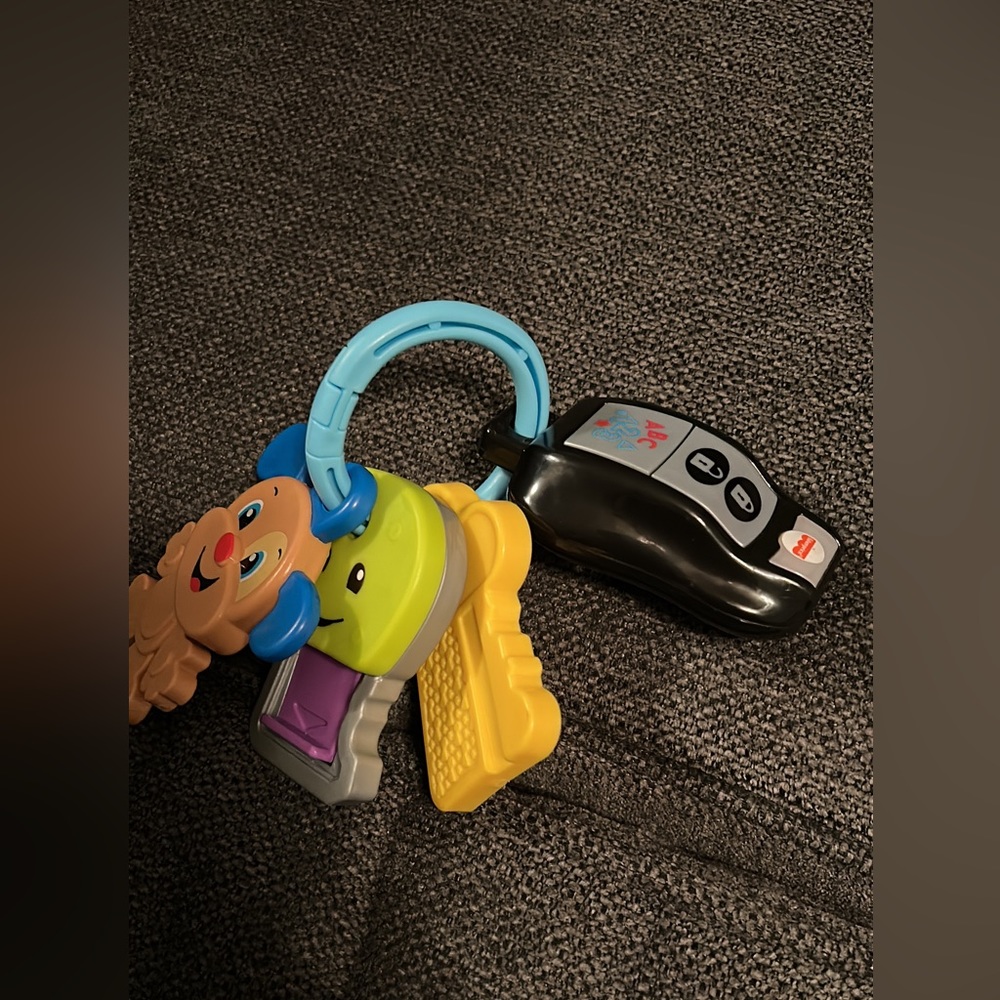 Fisherprice Infant Toy Keys. Will be sanitized before being shipped.